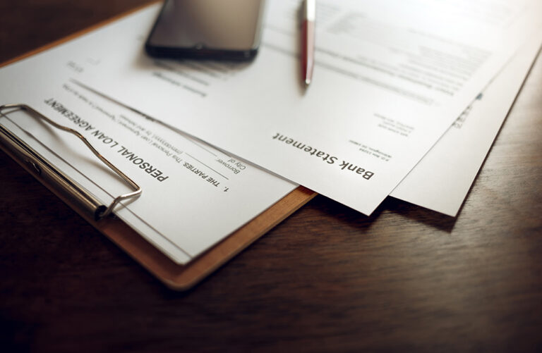 Image of a bank statement and loan application form.