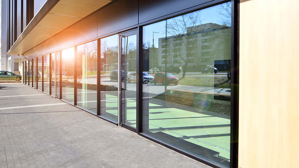 Commercial building with sun reflection in the window